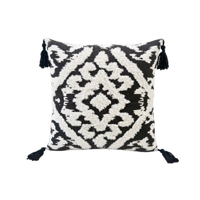 Coussin en coton et en damas avec fermeture à glissière et pompons
