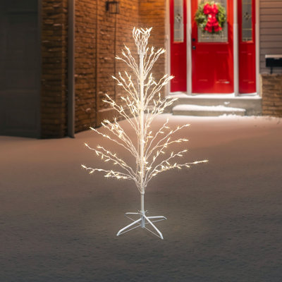 Arbre blanc avec brindille cascade éclairée