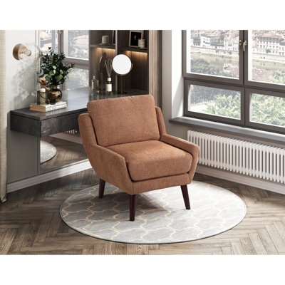 Chaise d'appoint contemporaine orange avec revêtement en chenille, structure en contreplaqué, mousse confortable à haute densité, coussins de dossier réversibles, assise lâche et pieds en bois finis, tissu uni