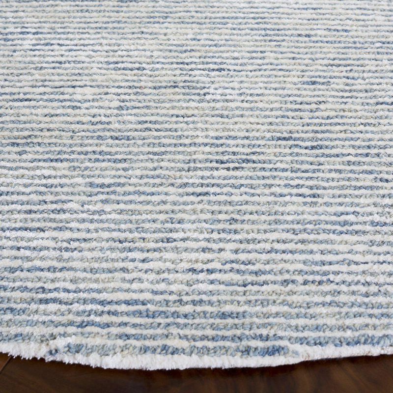 Ajnesh Hand Tufted Viscose/Wool Rug in Blue/Ivory, Round 6'