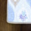 Tapis bleu en polyester à motif floral Bracamonte-1695045962