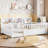 A full-sized wooden floor bed with a fence-style guardrail, featuring a side storage decorative function, and its color is white.-2048674399-2048674392
