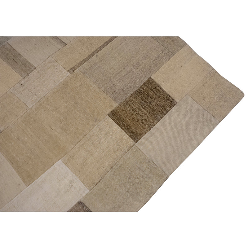 Hand Knotted Wool Area Rug in Beige