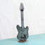Sculpture recyclée gloire de guitare Frick