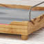 Lit pour animal de compagnie élégant avec un design industriel moderne et une structure en bois de manguier rustique pour un confort ultime
