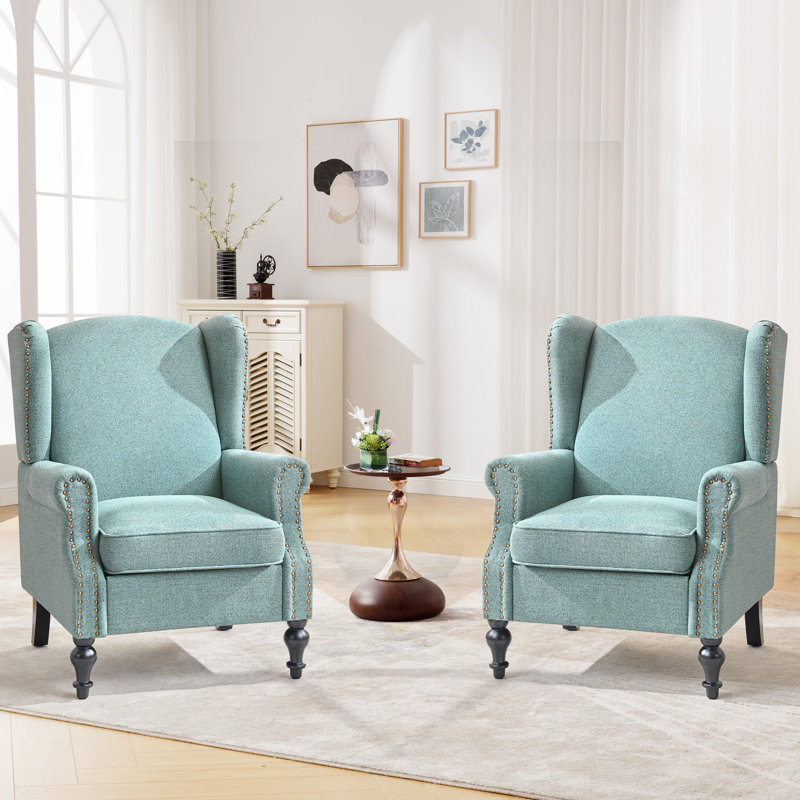 Fauteuil à oreilles rembourré avec garniture cloutée, Vert clair