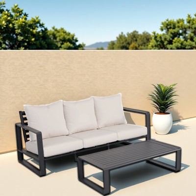 Élégante table basse rectangulaire à trois places, coussin gris doux, structure en aluminium stable, coussins modernes et relaxants, robuste