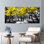 Ensemble de 3 tableaux sur toile tendue représentant un paysage en noir et blanc avec un arbre à fleurs jaunes, idéal pour la décoration du salon et de la chambre à coucher.