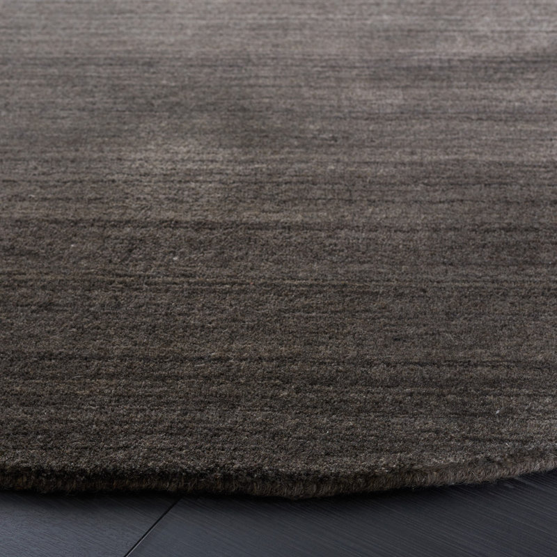 Thendara Hand Loomed Wool/Cotton Solid Color Rug in Charcoal, Round 6'
