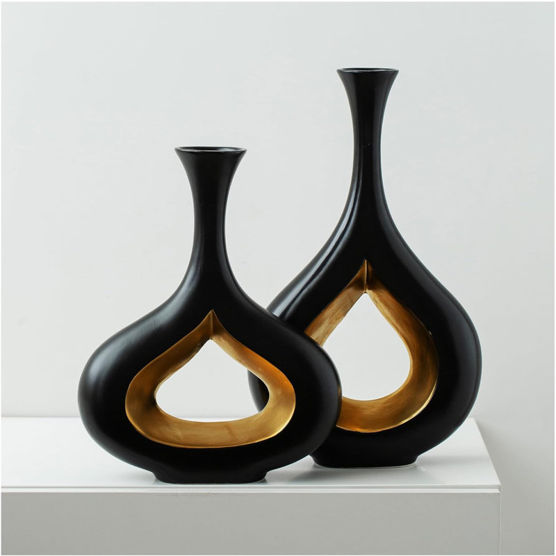 2 pièces de vases à beignes noirs et dorés 