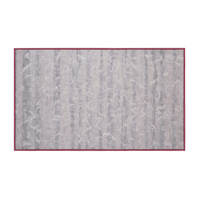 Tapis beige lavable à la machine
