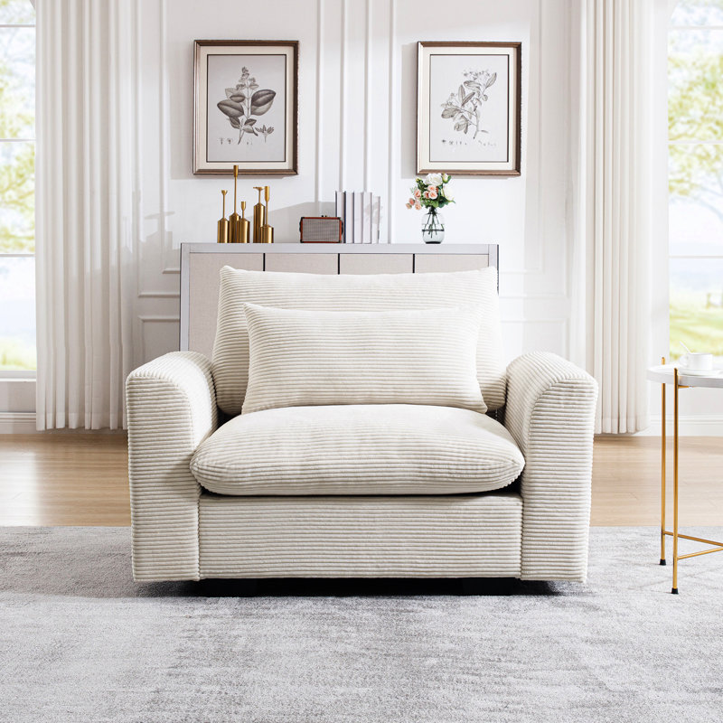 Fauteuil simple en velours côtelé à assise profonde - Coussin à la taille pour un appartement confortable, offrant une touche de douceur à l'espace