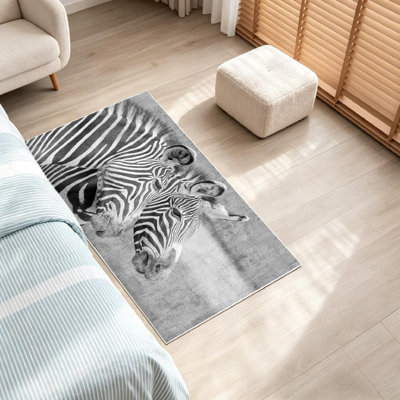Tapis intérieur noir lavable à la machine, à motifs de deux zèbres et d'un zèbre blanc