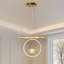 Luminaire suspendu moderne en forme de globe à anneaux croisés en or, lustre à DEL à intensité variable 3 couleurs pour la salle à manger