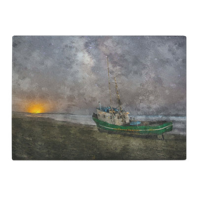Tempered Glass Grounded Fishing Boat at Dusk Chopping Board