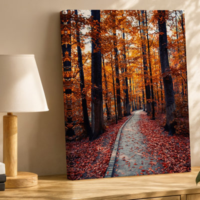 Canvas A Serene Autumn Forest Path Flanked By Towering Trees Adorned Wall Art With Vibrant Orange And Golden Leaves Creating A Warm Canvas Wall Art