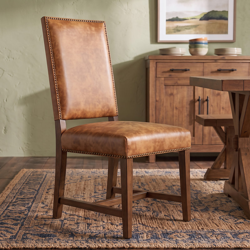 Chaise Dani en cuir brun chaud avec pieds en terre, Brun chaud