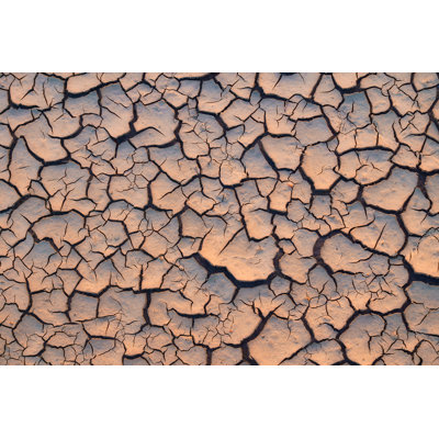 Arid And Dry Cracked Land by Mimadeo - Wrapped Canvas Print
