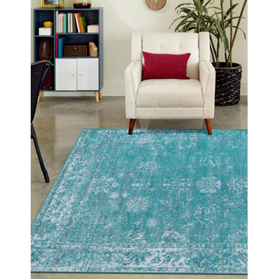 Tapis floral turquoise Brandt