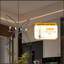 Luminaire suspendu en métal à 4 branches en laiton noir mat L 29 po x l 15 po x H 37,5 po