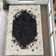 Tapis noir en cuir de vache noir