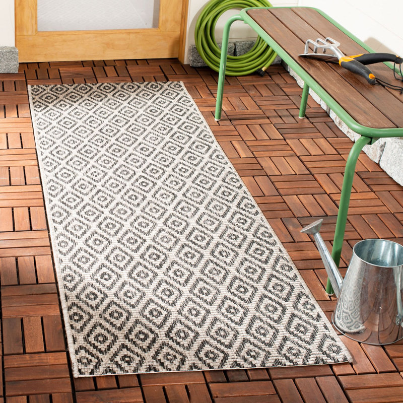 Arneshia Southwestern Navy Indoor/Outdoor Area Rug, Runner 2'3" x 6'7"