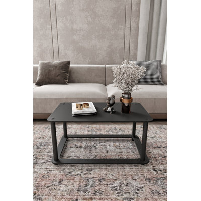 Table basse moderne noire 27,6 po x 15,0 po x 16,9 po | 100% panneau de fibres à densité moyenne avec pieds en kraft comprimé | Design industriel, couleur unie - parfait pour les salons et les salons, meubles de maison élégants et durables