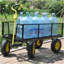 Les chariots de jardin BIG Wagon Cart facilitent le transport du bois de chauffage jaune et noir. La charge statique maximale est de 880 lb.