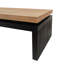 La table basse en bois massif noir et naturel, avec un bureau de salon rustique, ajoute du charme