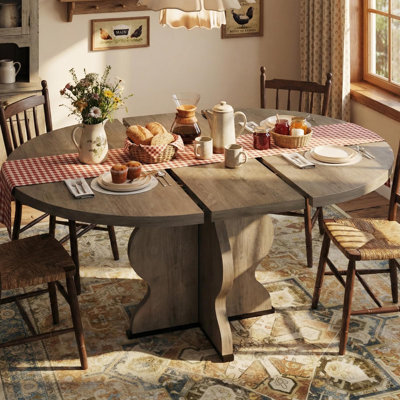 47"-63" Extendable Round to Oval Dining Table for 4-8, Farmhouse Expandable Wood Kitchen Table with Extra-Wide Legs, Metal Frame, Space-Saving for Apartment