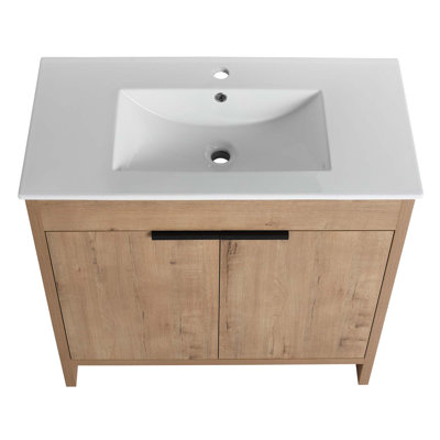 Meuble-lavabo autoportant avec lavabo en céramique et 2 portes d'armoire à fermeture en douceur