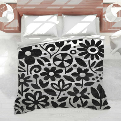 Édredon noir à motif floral