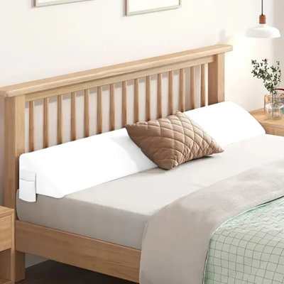 Coussin de remplissage pour combler l'espace entre le matelas et la tête de lit, le cadre de lit ou le mur.