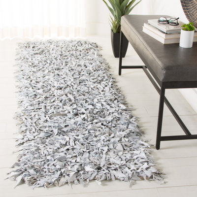 Arik Handwoven Leather/Cotton Solid Color Rug in White/Gray