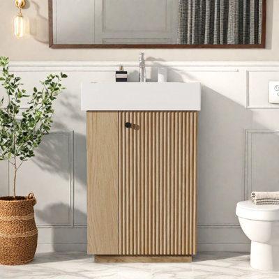 Meuble-lavabo de 22 po avec plateau en céramique, porte-papier intégré, tablettes ouvertes et armoire