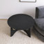 Table basse noire en bois-563889171