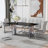 Modern Minimalist Dining Table. The Black Imitation Marble Glass Desktop Is Equipped With Silver Metal Legs