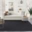 Tapis intérieur / extérieur noir uni en polypropylène tissé à la machine 8 pi x 10 pi