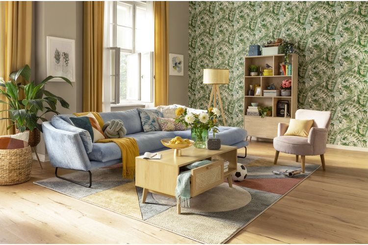 living room accent wall with botanical pattern wallpaper accent wall