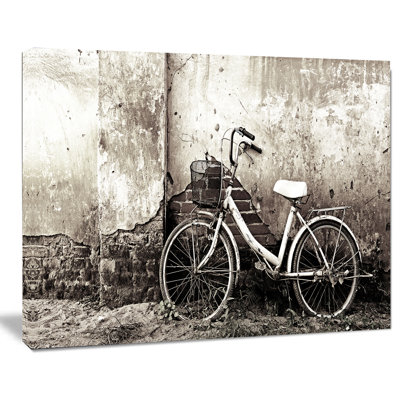 " Old Bicycle And Cracked Wall "