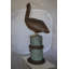 Statue Hooten Pelican sur une souche