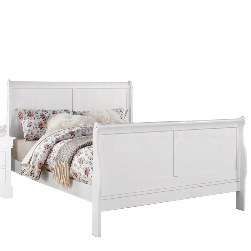 Grand lit blanc avec tête de lit élégante et structure solide