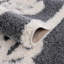 Tapis noir / blanc en polyester tissé à la machine Adrienne-966071570