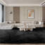 Tapis noir en fausse peau de mouton fabriqué à la main Mamdouh-303062738