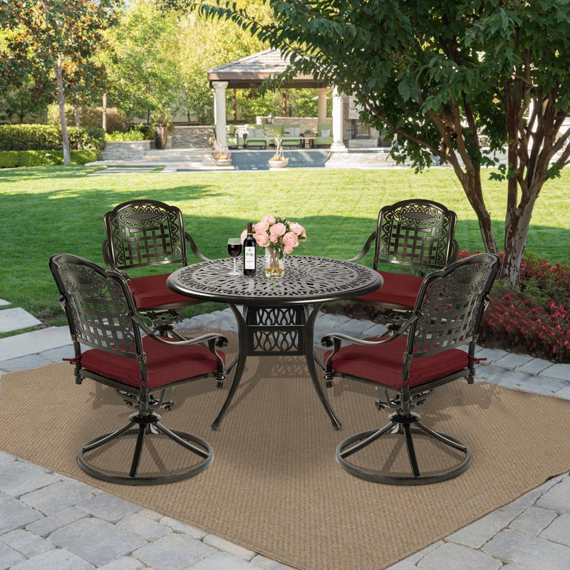 4 - Person Patio Dining Set with Round Table , Cushions Included, Chili Red