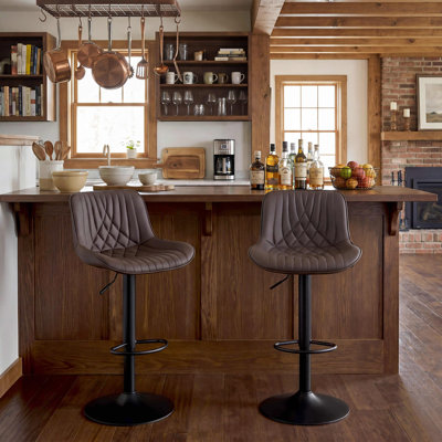 Tabouret de bar pivotant en similicuir Zager
