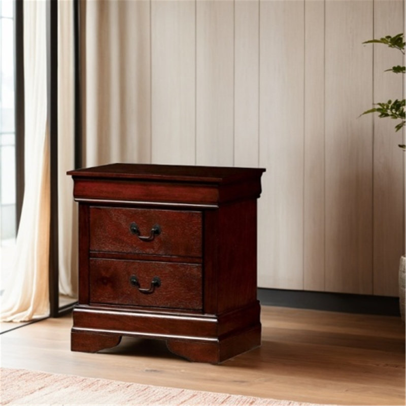 Charmante table de chevet en bois massif avec poignées antiques pour une chambre à coucher élégante