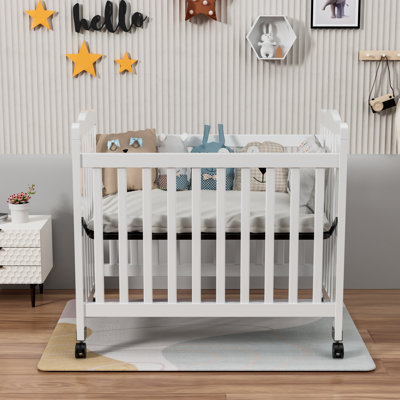 Hinojosa Mini Crib With 3 Position Adjustable Mattress Board