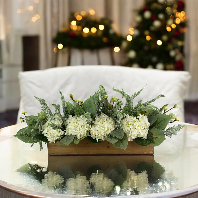 Holiday Arrangement with Wintry Greens and Hydrangeas