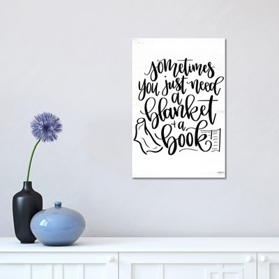 A Blanket and a Book 1 Piece Wrapped Canvas Wall Art